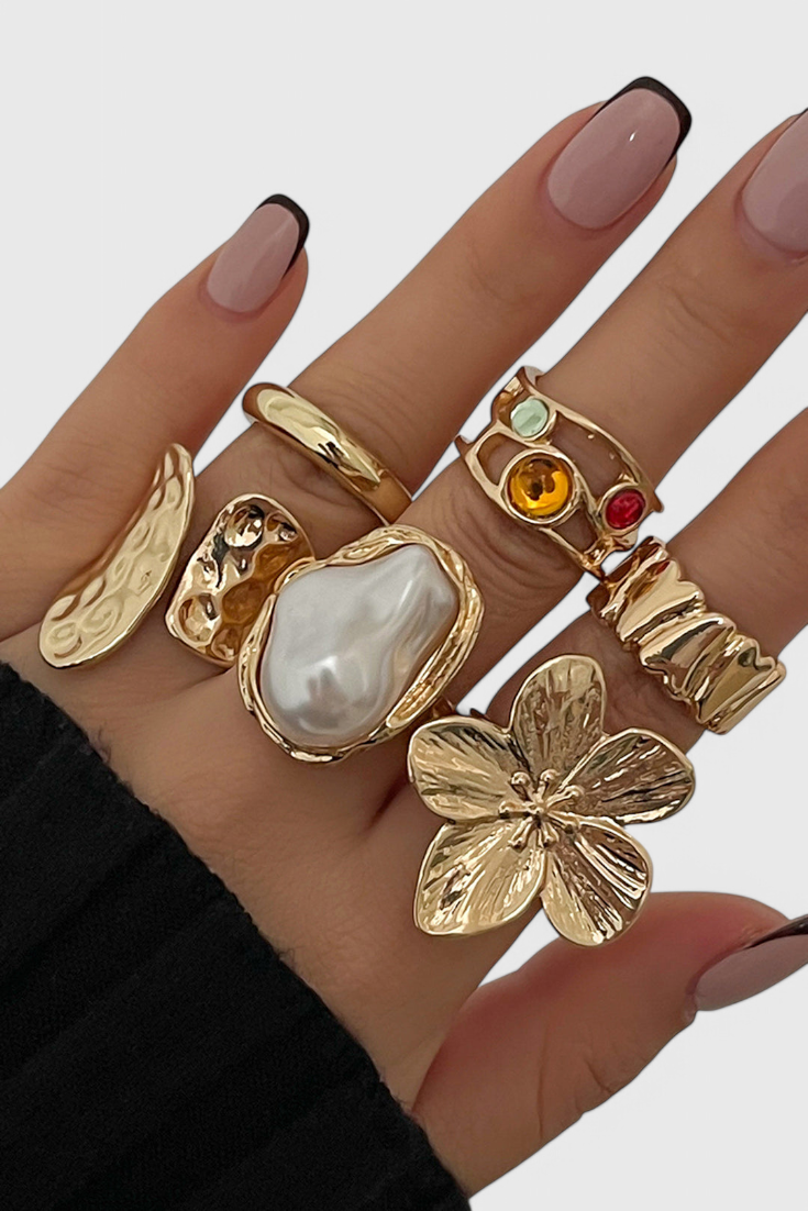 Anillo Abierto en Forma Floral con Perla Fluida