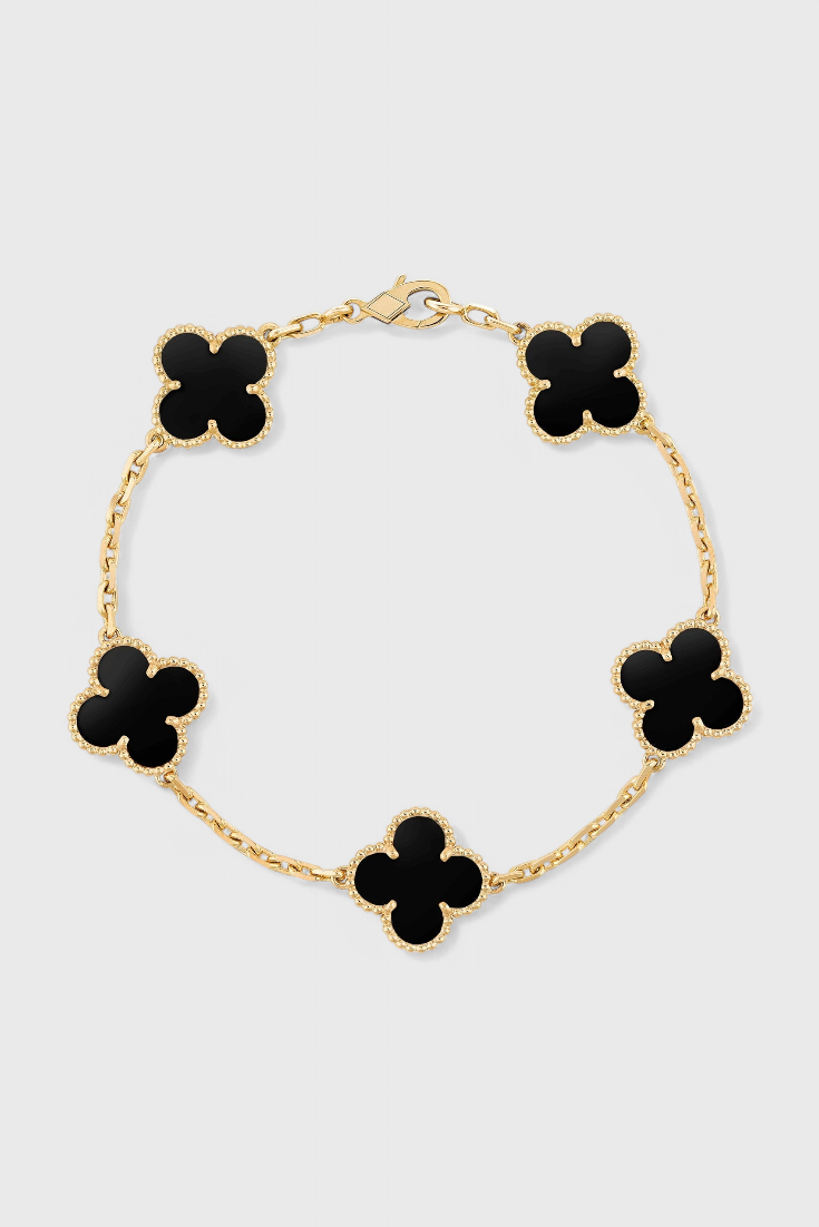 Pulsera con Motivo de Trébol y Elegancia Dorada