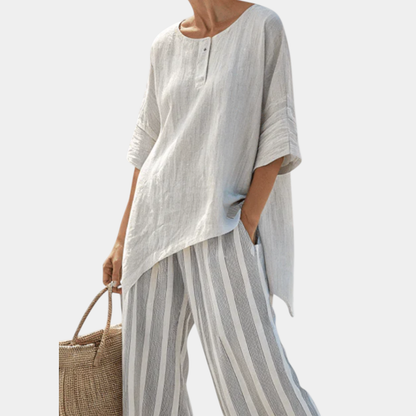 Fiorella | Blusa asimétrica elegante y pantalones a rayas