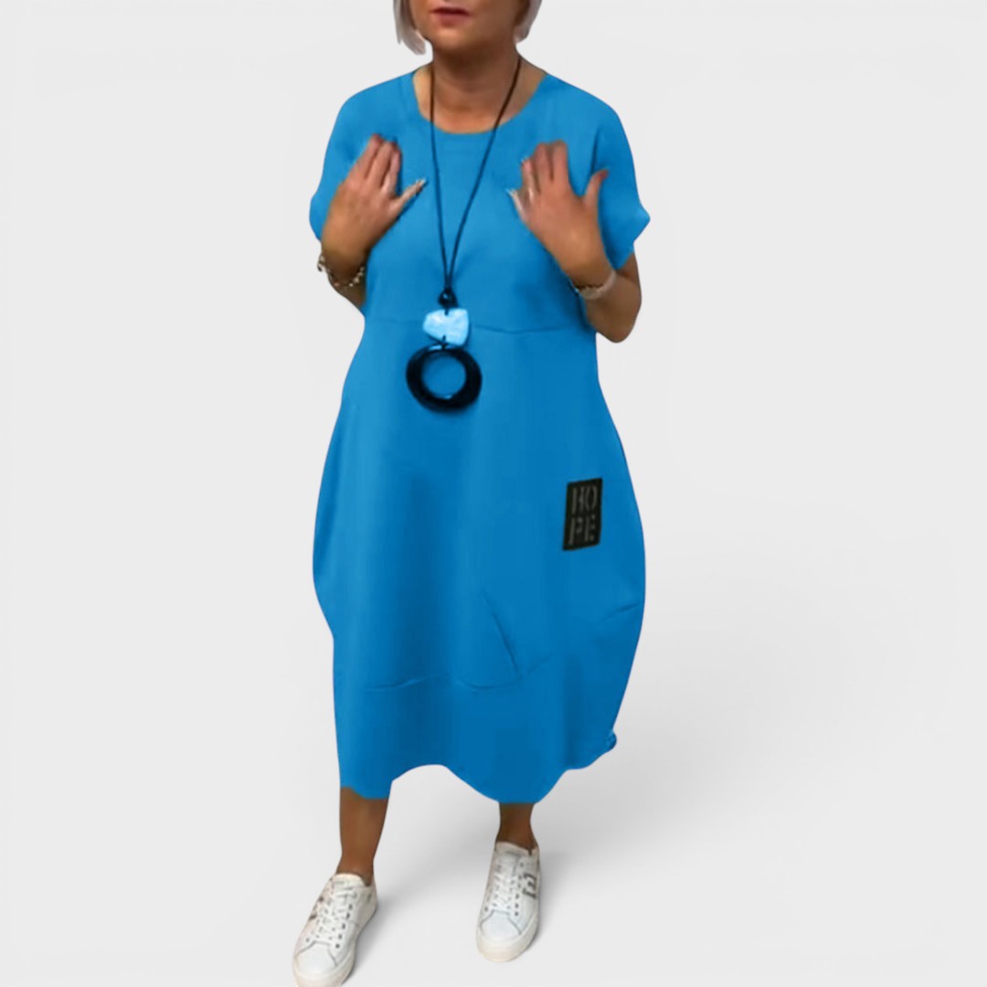 Nicole | Vestido midi fluido con bolsillos