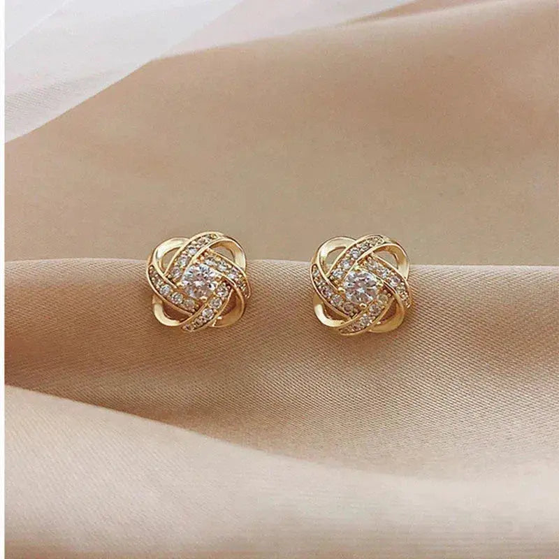 Lourdes™ | Pendientes de Espiral con Cristales