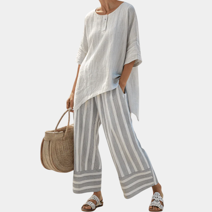 Fiorella | Blusa asimétrica elegante y pantalones a rayas