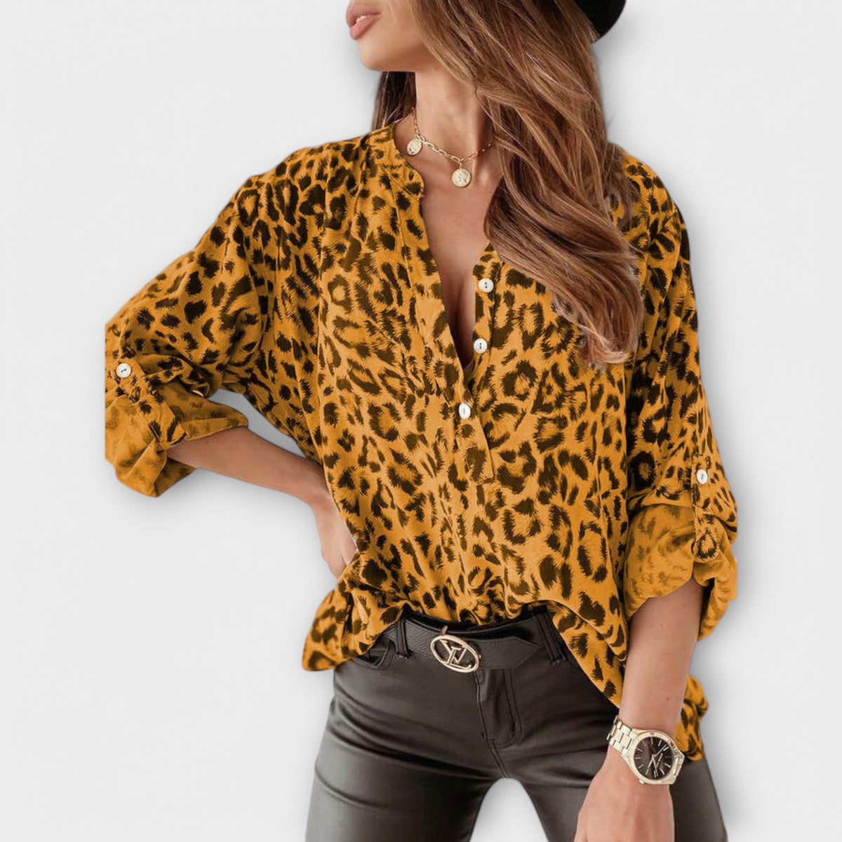 Blusa elegante con motivo leopardato
