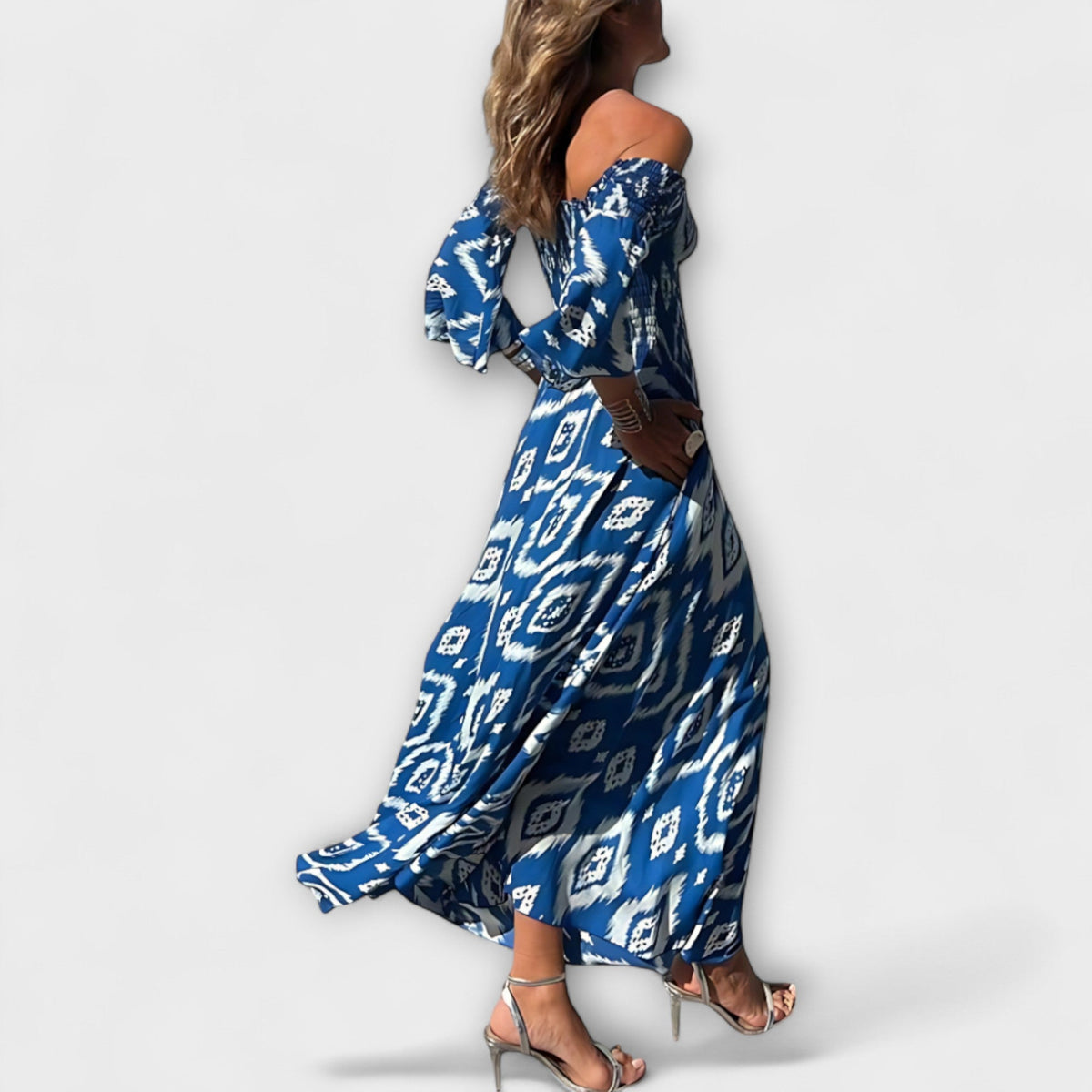 Bella - Vestido de tirantes descubiertos y océano de flores