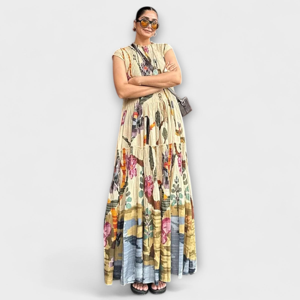 Túnica elegante plisada de manga larga