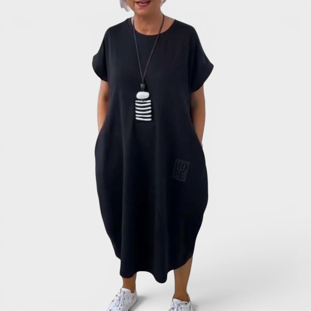 Nicole | Vestido midi fluido con bolsillos