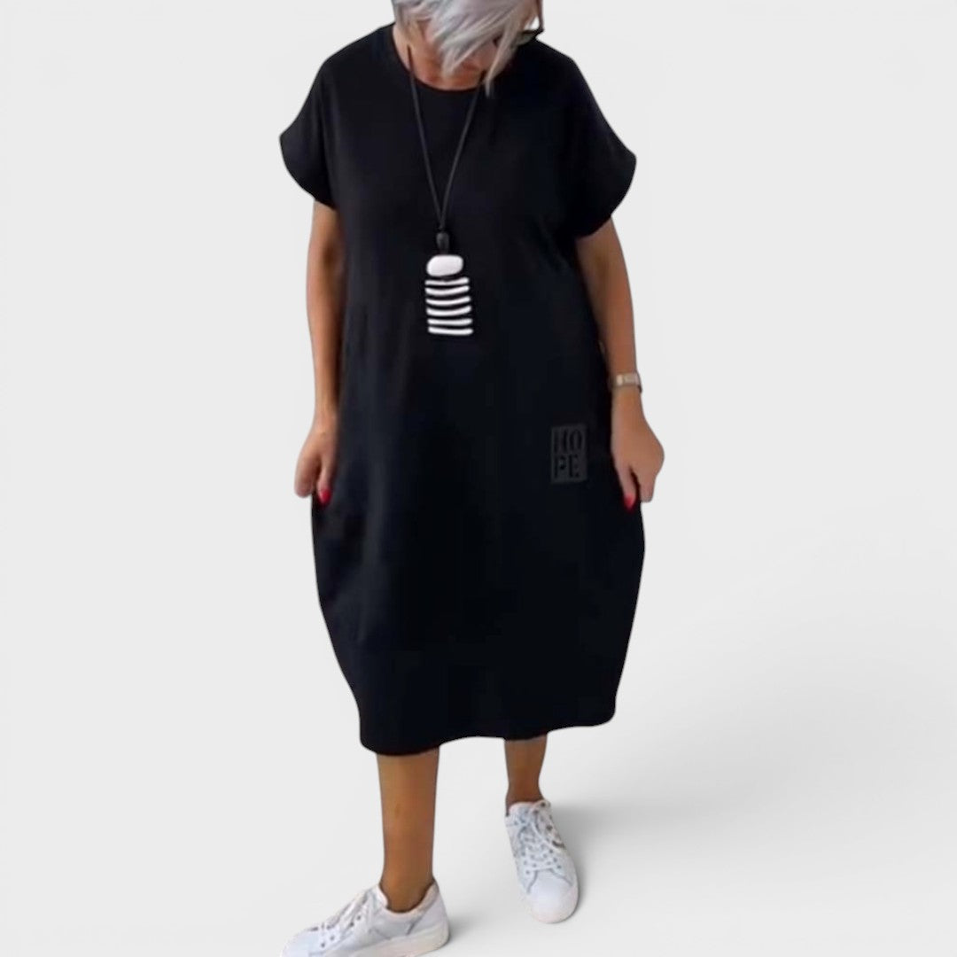 Nicole | Vestido midi fluido con bolsillos