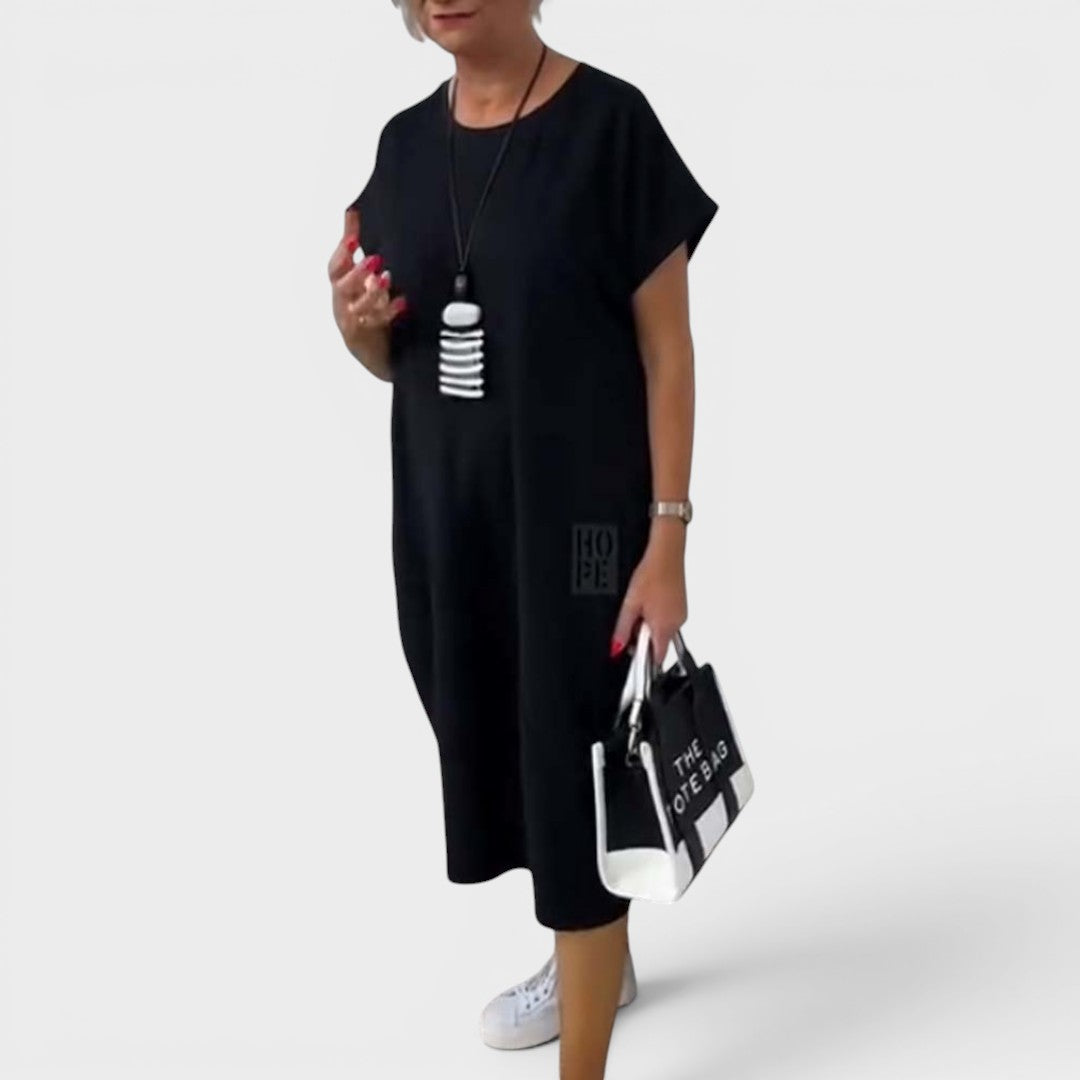 Nicole | Vestido midi fluido con bolsillos