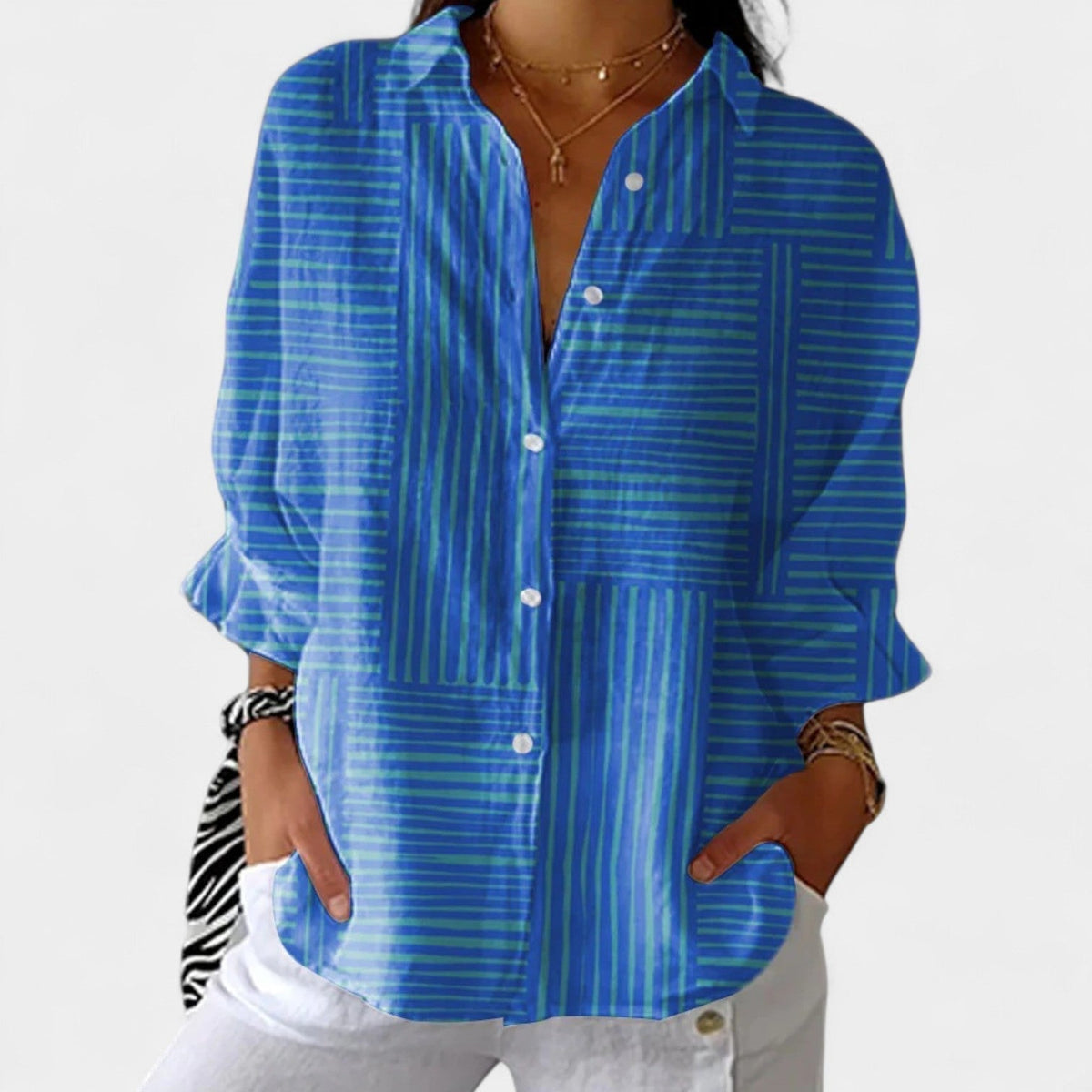 Nika – Blusa de verano con un motivo vibrante