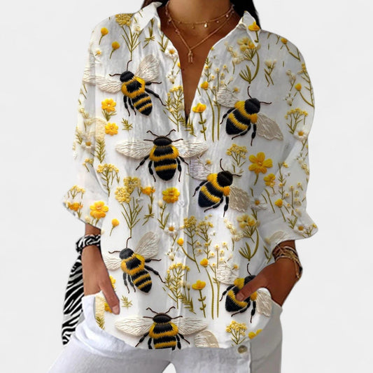 Nika – Blusa de verano con motivo vibrante