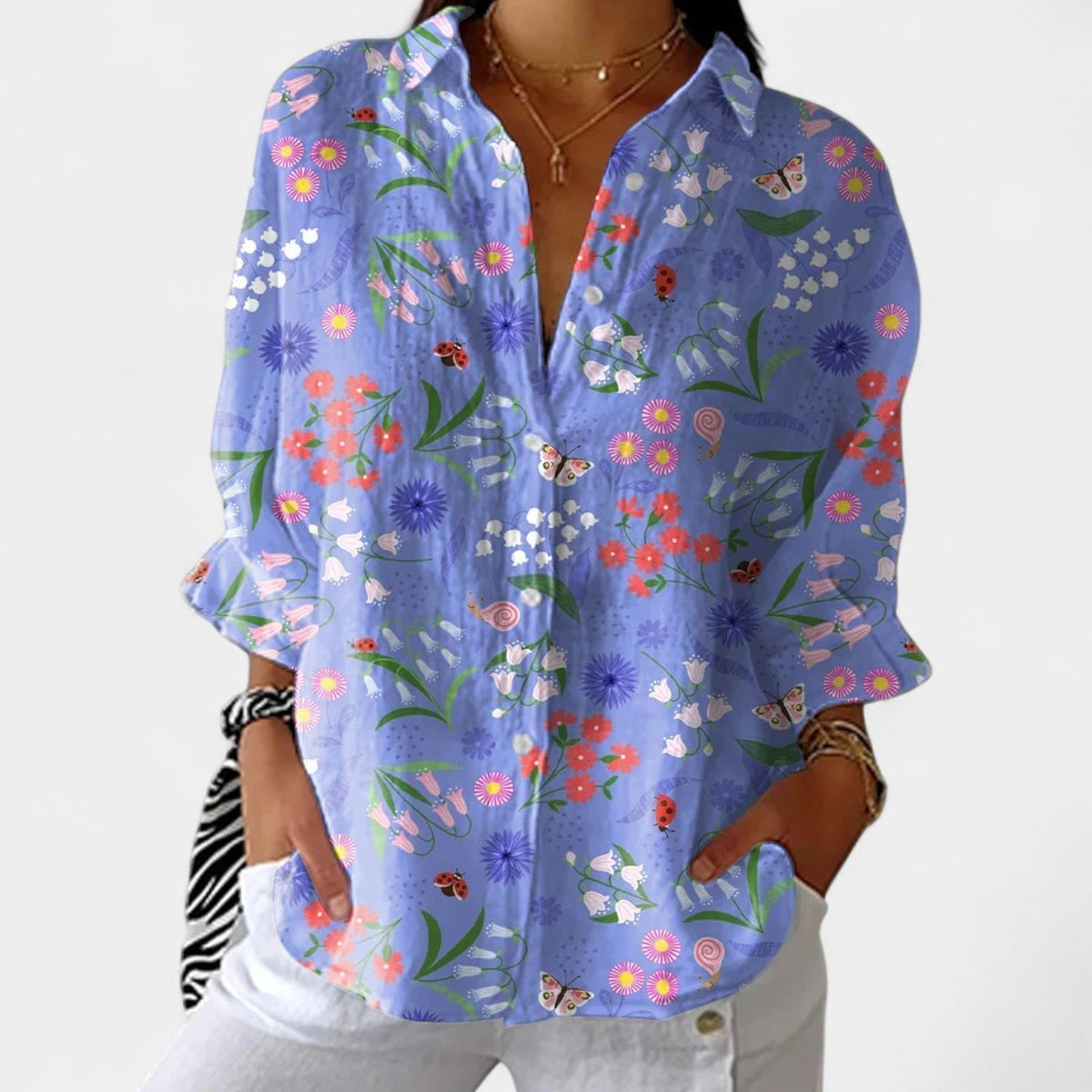 Nika – Blusa de verano con un motivo colorido
